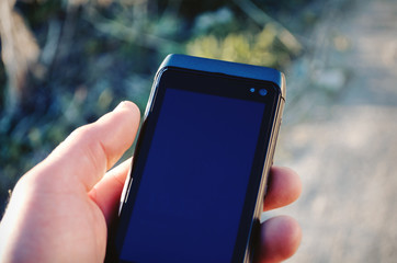 Business concept, in the hands of a businessman phone