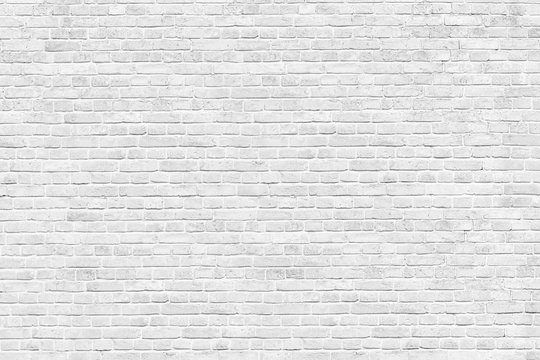 Fototapeta Old white brick wall background, wide panorama of masonry