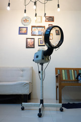 The steam hair dryer in the hair salon
