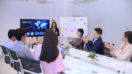 Business concept. Women are presenting work at the meeting.