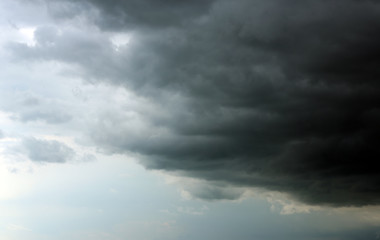 Naklejka na ściany i meble Sky with heavy rainy clouds on grey day