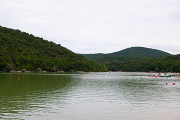 Cypress Lake in Succo. Attractions Anapa. Green lake. Lake with clear water. . The nature of Russia. Trees grow in the water.