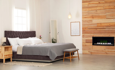 Modern comfortable bed in room. Interior design