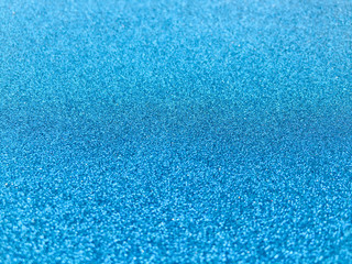 Fototapeta na wymiar blue texture of glitter