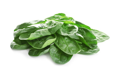 Heap of fresh green healthy baby spinach leaves isolated on white