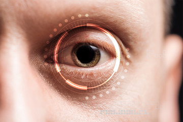 close up view of human eye with data illustration, robotic concept