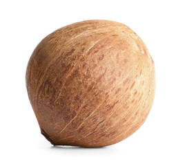 Ripe whole brown coconut on white background