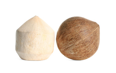 Fresh ripe whole coconuts on white background