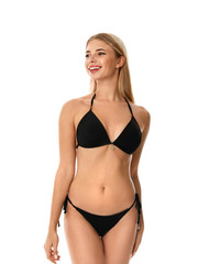 Obraz premium Pretty young woman wearing stylish bikini on white background