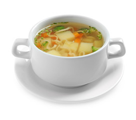 Dish of fresh homemade vegetable soup on white background