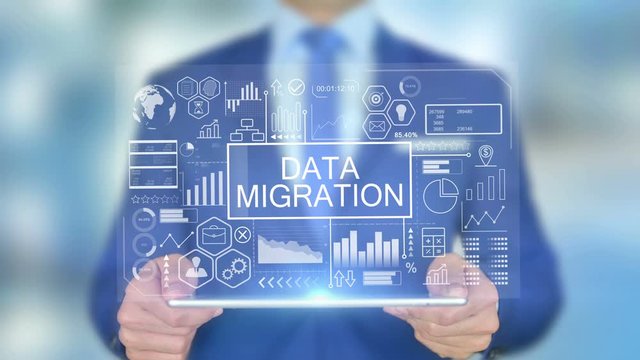 Data Migration, Businessman with Hologram Concept