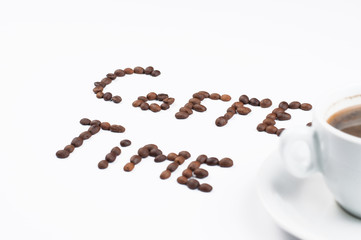 Coffee beans and coffee cup isolated on white background.Coffee time.Copy space.