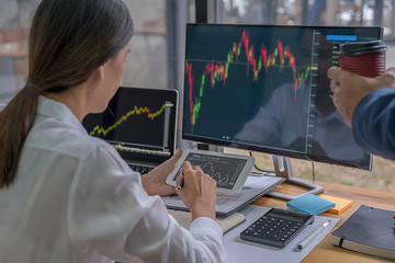 Business team investment trading do this deal on a stock exchange developing new approaches.