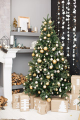 Christmas presents/gifts under fir-tree. Vintage New Year decorations. gift boxes and lantern under fir-tree. Christmas mood. Celebrating of New Year