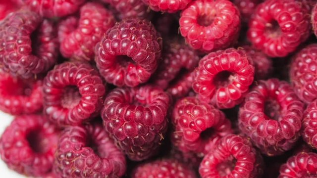 Close Up Rotation Loopable Berry. Fresh, Juicy Raspberry Background, Ripe. Macro Red Raspberries Fruit. Fresh Raspberry Fruits As Food Dackground. Healthy Food Organic Nutrition.