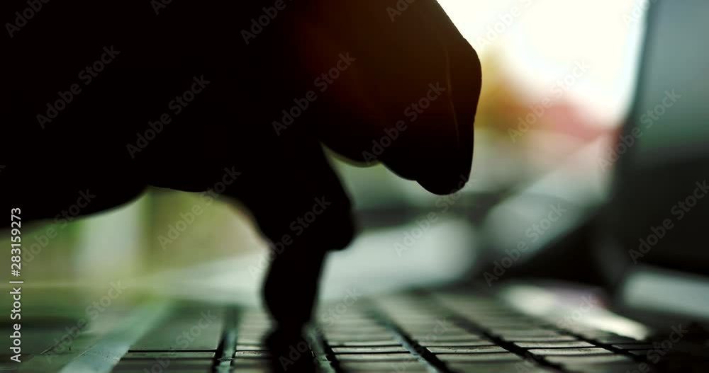 Poster silhouette of hands typing on computer keyboard, business man working on laptop pc in office