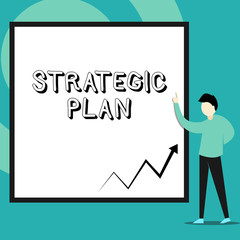 Naklejka premium Conceptual hand writing showing Strategic Plan. Concept meaning A process of defining strategy and making decisions Man standing pointing up blank rectangle Geometric background