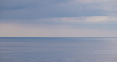 Fototapeta na wymiar Sea in cloudy weather. Calm sea. View of the sea from a height. Anapa district. The vastness of Russia. Black Sea . Summer landscape sea and sky