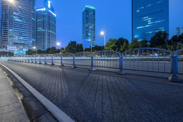 empty urban road with modern building in the city.