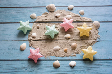  Creative sandbox beach shells stars dream fashion background on blue wooden board