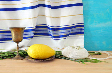 Jewish festival of Sukkot. Traditional symbols (The four species): Etrog, lulav, hadas, arava