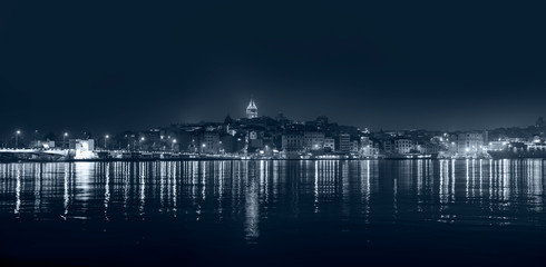 Black & White Photo of - Galata Tower, Galata Bridge, Karakoy district and Golden Horn at night, istanbul - Turkey