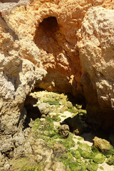 Small cave and rock formation in the Ponta Da Piedade Headland in Lagos