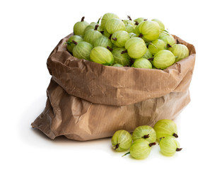 Paper bag full of gooseberries isolated on white