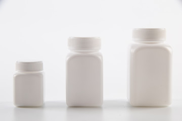 medicine white pill bottle isolated without shadow clipping path - photography