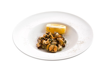 Marinated mussels and slice of lemon