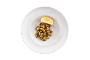 Marinated mussels and slice of lemon