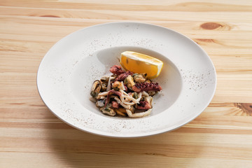 Salad with octopus, shrimps and mussels