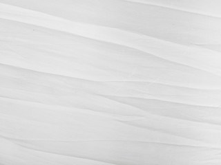 Soft white wrinkled fabric background