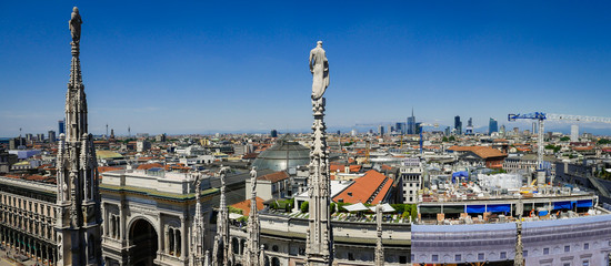 Fototapeta na wymiar Panoramic view from roof terrace of Milan Catehdral in Italy