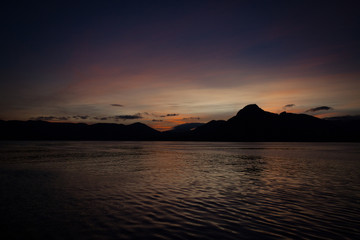 Purple late evening night sky reflected in the calm water