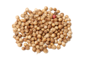 Coriander seeds on white background 