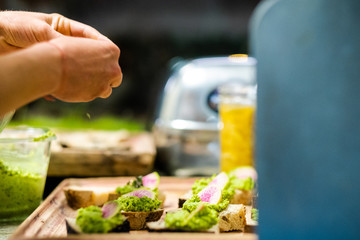 Woman cutting vegetables in kitchen