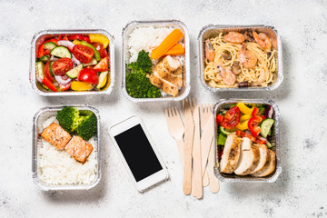 Food delivery concept - healthy lunch in boxes.