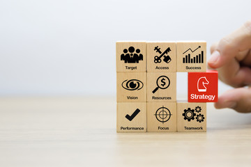 Strategy business concept on wooden Block.