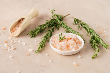 Pink Himalayan salt with fresh rosemary twigs.