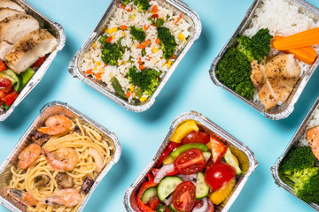 Food delivery concept - healthy lunch in boxes.