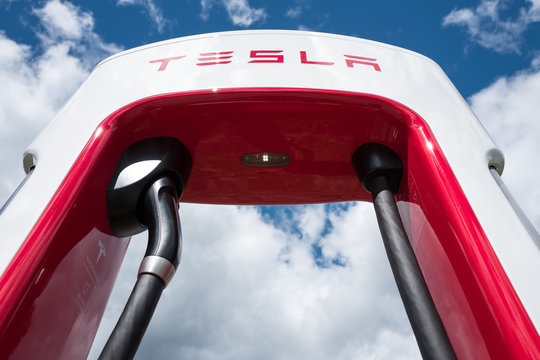 EIDFJORD, NORWAY - June 11, 2017: Tesla supercharger station. In order to allow quick charging of Tesla cars, in 2012 Tesla began building a network of 480-volt fast-charging Supercharger stations.