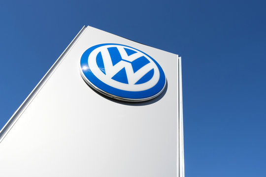 NOORDWIJK, THE NETHERLANDS - JUNE 29, 2019: dealership sign against blue sky. is a German automaker founded on 28 May 1937 and headquartered in Wolfsburg.