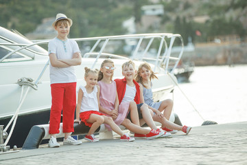 Fashionable children by the sea. Children's fashion. 