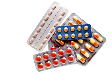 multicolored pills, healthcare and medicine