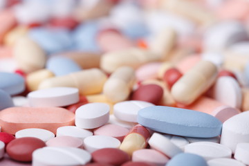 multicolored pills, healthcare and medicine