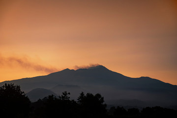 sultry sunset over the Etna volcano