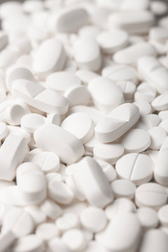 white pills, healthcare and medicine © ridvanarda