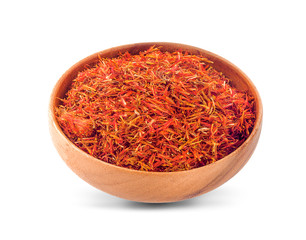 Safflower in a bowl on white background