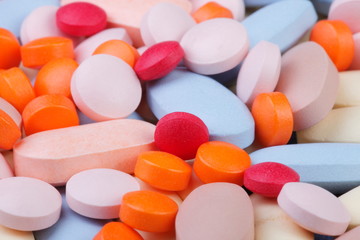 multicolored pills, healthcare and medicine